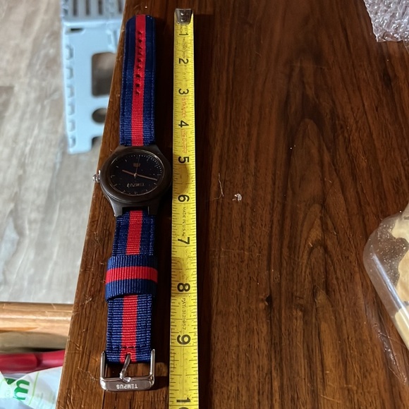 Blue Dial Watch with Red and Blue Strap